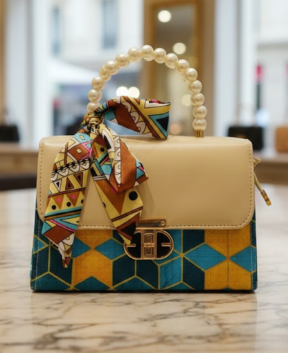 Elegant Pearl-Handle Satchel with Ornate Patterning Bag